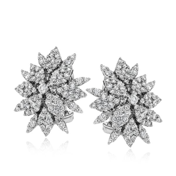These gorgeous stud earrings take their cues from nature and are covered with 1....