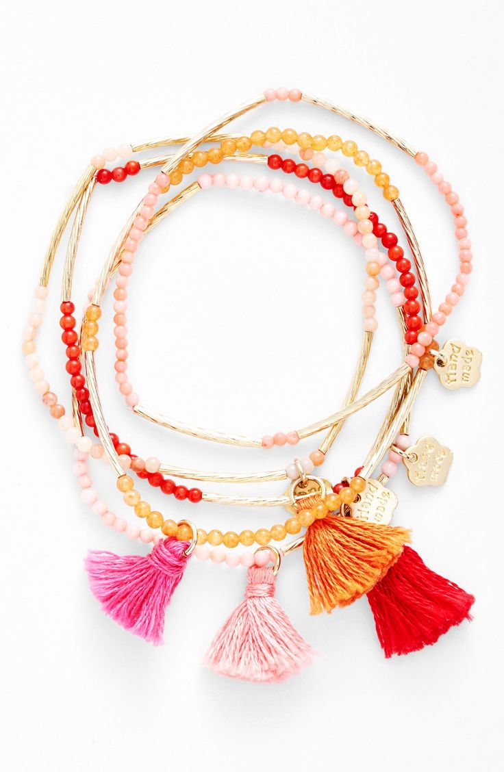 Crushing on these colorful stackable bracelets.