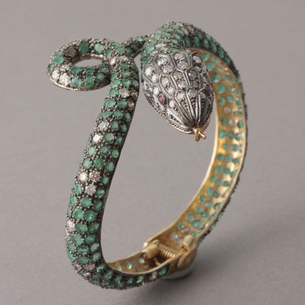 Emerald, diamond and ruby snake bracelet.