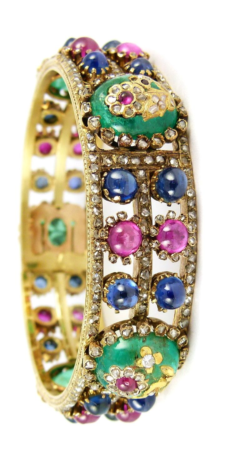 Emerald, ruby, sapphire, diamond and gold bracelet.