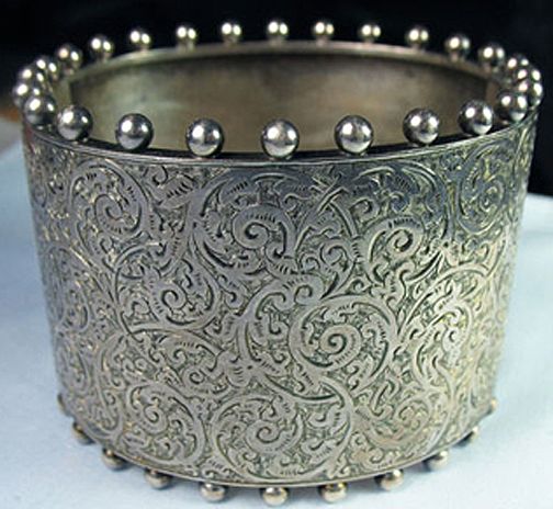 Engraved silver bracelet.