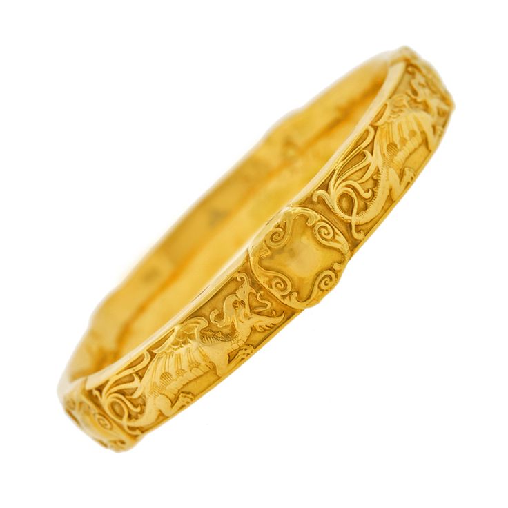 Gold dragon bracelet.