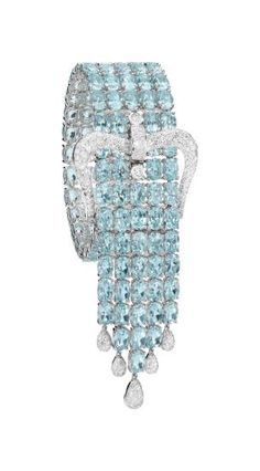 ADLER A Blue Topaz and Diamond Bracelet Designed as five lines of oval-cut blue ...