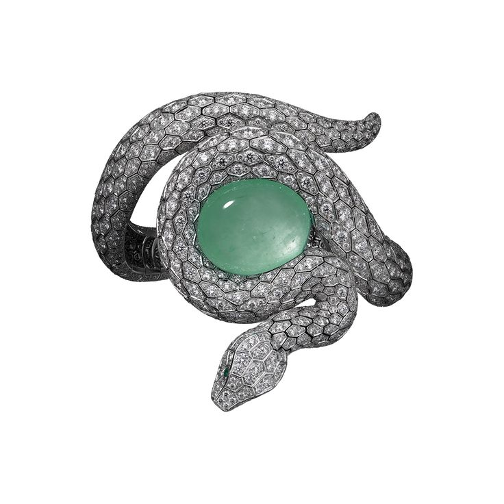 Cartier : Bracelet - platinum, one 53.78-carat cabochon-cut emerald from Brazil,...