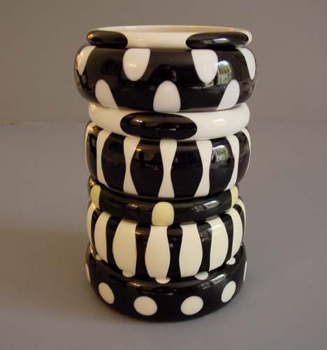 SHULTZ bakelite black and white bangle stack.