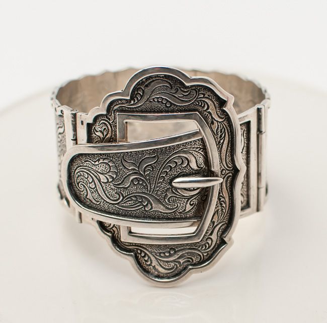 Silver buckle bracelet.