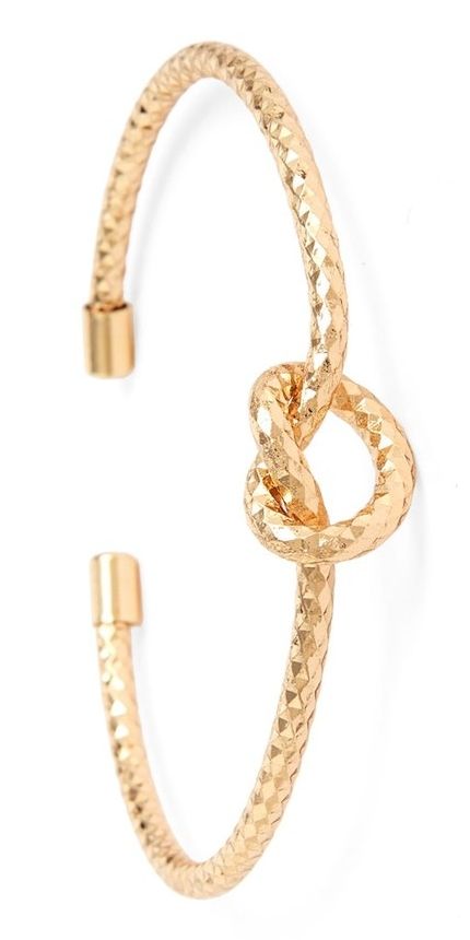 Crushing on this eye-catching cuff designed with a texture that beautifully refl...