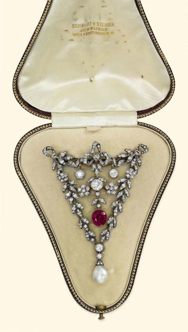A BELLE EPOQUE RUBY, DIAMOND AND PEARL BROOCH. Of garland design, the old-cut di...