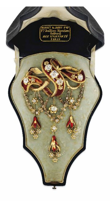 A MID-19TH CENTURY ENAMEL AND DIAMOND BROOCH Modelled as a chased gold bough ent...
