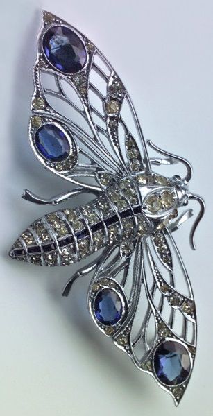 An Art Deco moth brooch, by Weir & Sons, Irish, circa 1930. Silver chromed, faux...