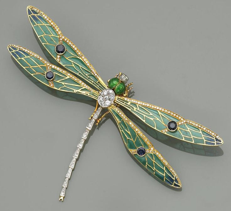 An enamel, diamond, sapphire and eighteen karat gold dragonfly brooch the plique...