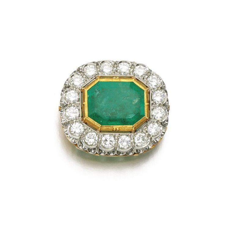 Emerald and diamond brooch Set with a step-cut emerald within a border of brilli...