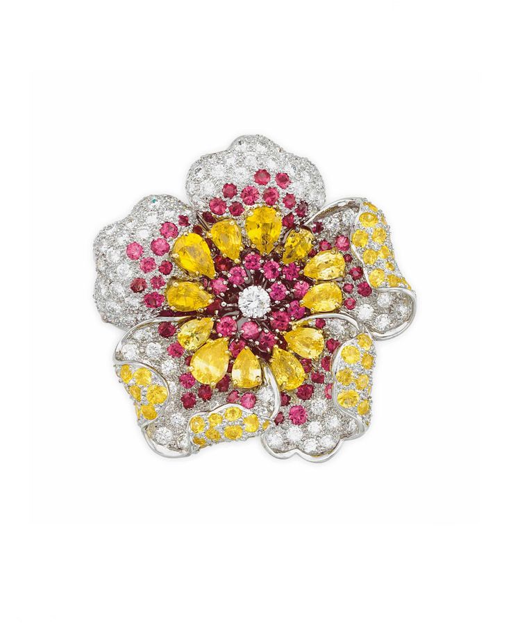 A DIAMOND, RUBY AND COLORED SAPPHIRE FLOWER BROOCH, BY HARRY WINSTON. Designed a...
