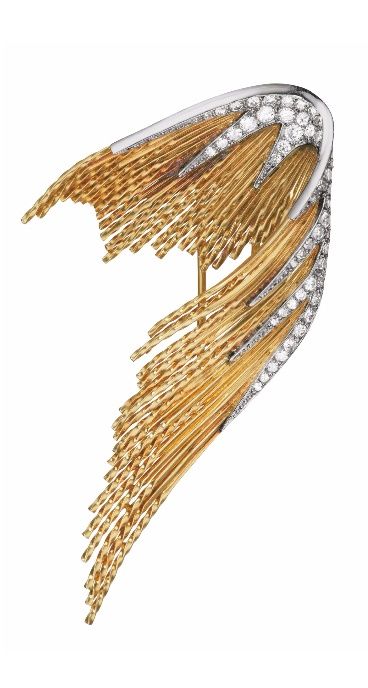 A Gold and Diamond Brooch, 1960's. Sterlé for Chaumet. Designed as a styliz...