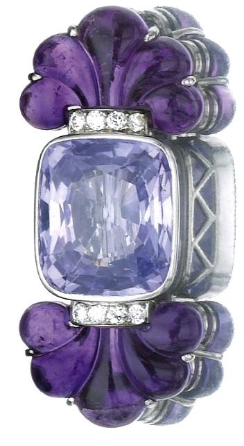 rubies.work/... A carved amethyst, diamond and violet sapphire brooch by Meister...
