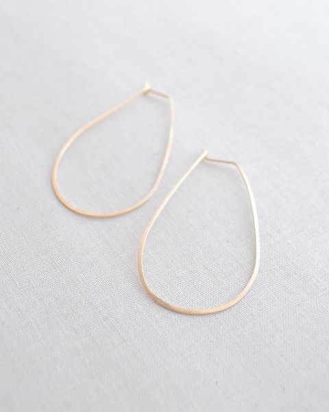 Hammered Large Hoop Earrings with slight teardrop shape. Handmade by Olive Yew i...