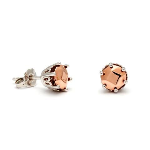Silver and rose gold Solitaire stud earrings.