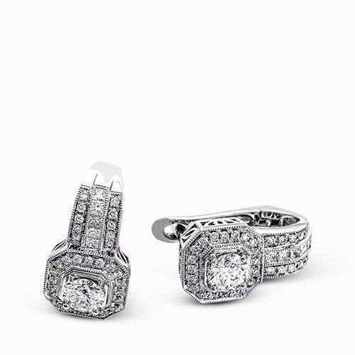 Taking a modern twist on vintage styling, these brilliant white gold earrings ar...
