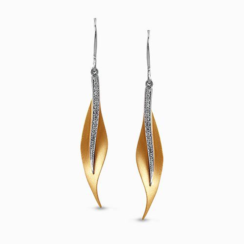 The leaf-like design on these modern earrings was inspired by nature. They conta...