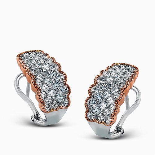 These remarkable white gold contemporary earrings are complimented by 3.08 ctw o...