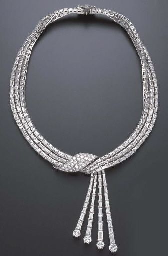 A SPECTACULAR DIAMOND NECKLACE   Designed as graduated baguette-cut diamond arti...