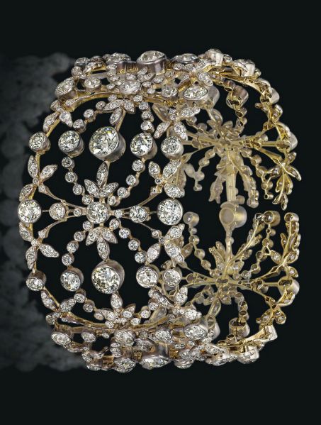 Diamond collar. Designed as six openwork lattice panels composed of circular-cut...