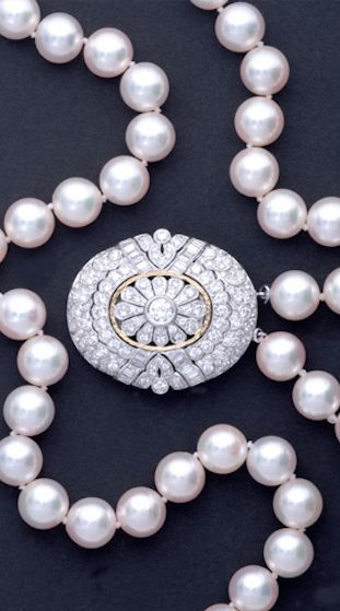 Diamond, pearl and gold necklace.
