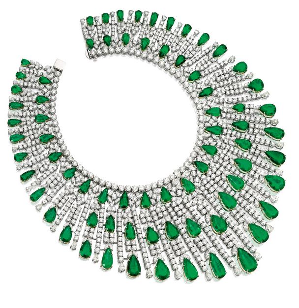 Emerald and Diamond Bib Necklace:  Of cascading design, set with seventy-two gra...