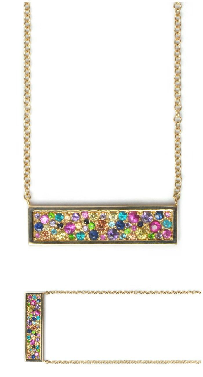I love this multicolored rainbow bar necklace by Anzie!