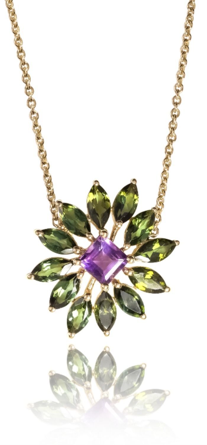 The Ayva jewelry Nina necklace. Green tourmaline with diamonds and amethyst.ring...
