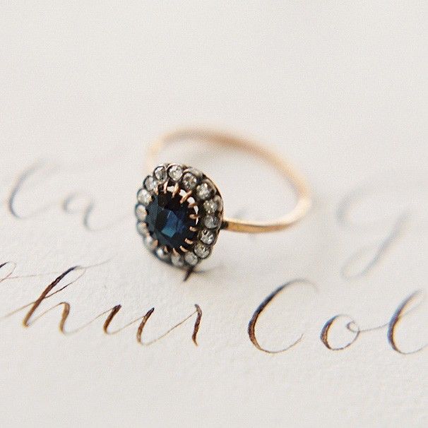 Deep navy sapphire halo ring ♥ photo by Carmen Santorelli