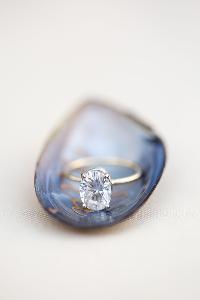 Elegant Oval Diamond Engagement Ring on a Mussel Shell