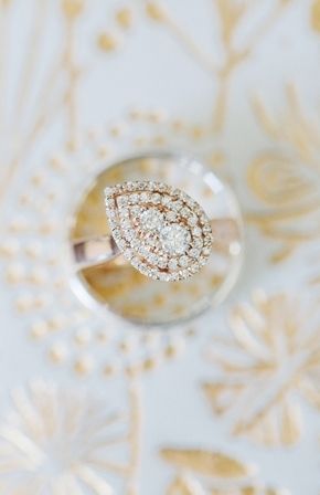 Pear shaped diamond wedding ring  Photo by: Larissa Nicole Photography on Bridal...
