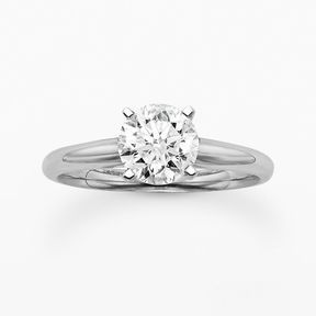 Round-cut  colorless diamond solitaire engagement ring  1 1/12 carats