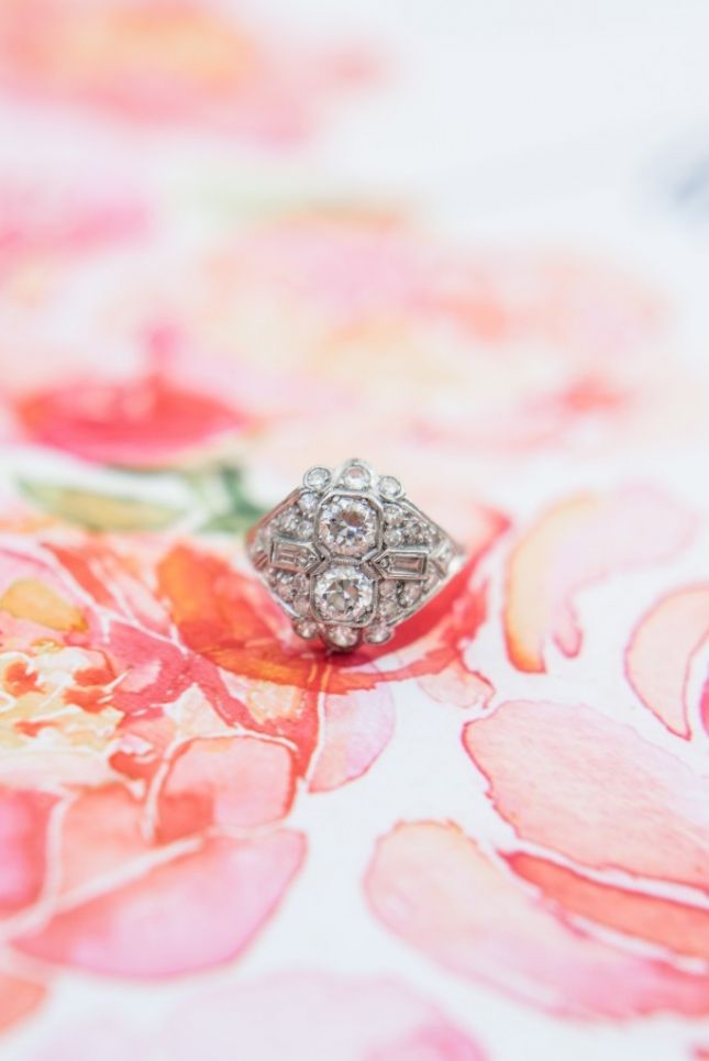 Vintage ring on watercolor background