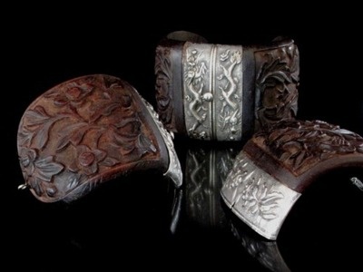 Chinese silver and wood bracelets.