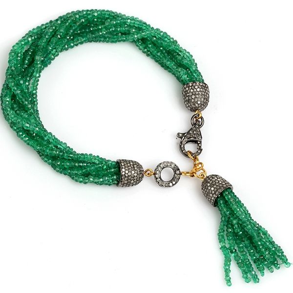 Emerald and diamond tassel bracelet.
