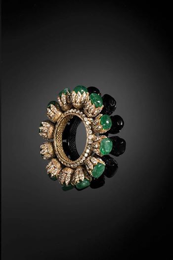 Emerald, diamond and gold bracelet.