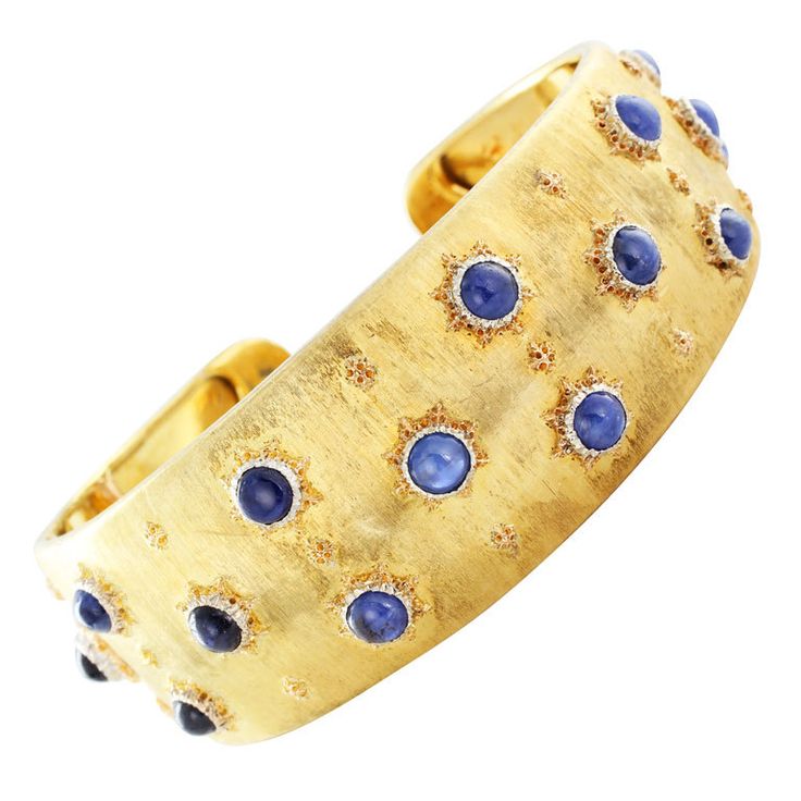BUCCELLATI Gold & Sapphire Bracelet 18 karat yellow gold cuff bracelet set with ...