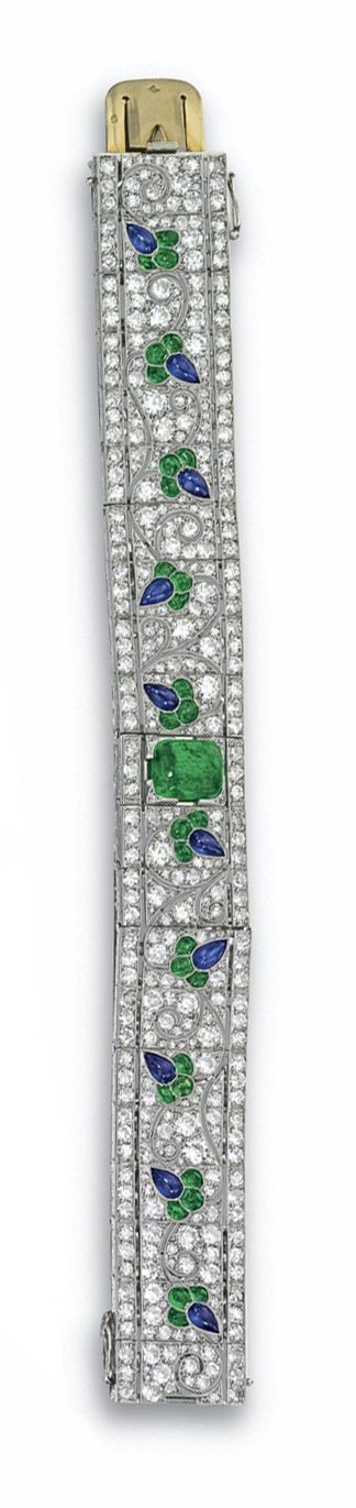 EMERALD, SAPPHIRE AND DIAMOND BRACELET, FRENCH, CIRCA 1925. The articulated band...