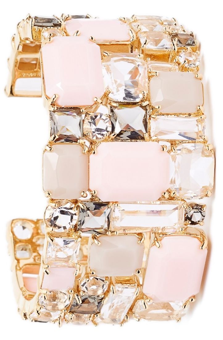 This lovely pastel pink and crystal cuff is the perfect accessory for parties.