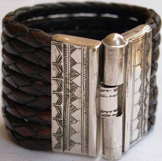 Silver and leather bracelet.