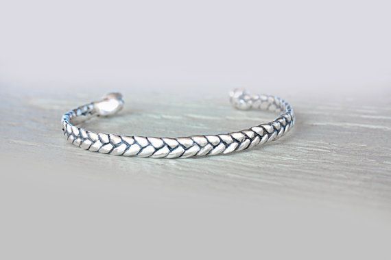 This bracelet is 100% handmade creation. It looks like a real braid around your ...