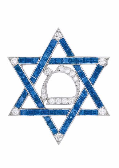 A Sapphire and Diamond Brooch, Cartier The Star of David decorated with sapphire...