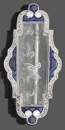 A belle époque rock crystal, sapphire and diamond brooch, circa 1900. The rock ...