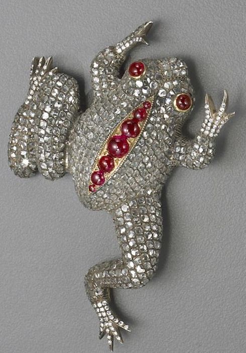 A diamond, ruby, silver and gold frog brooch the body pavé-set throughout with ...