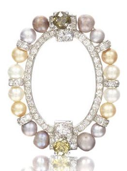 A vari-coloured natural pearl and diamond circlet brooch, by Cartier, circa 1915...