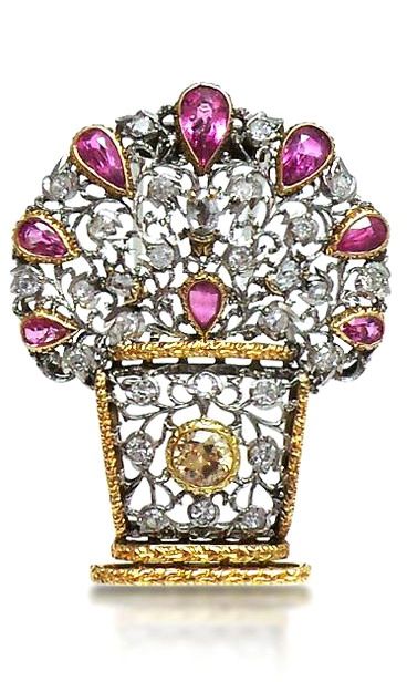 AN 18K WHITE AND YELLOW GOLD BROOCH SET WITH RUBIES AND DIAMONDS, SIGNED MARIO B...