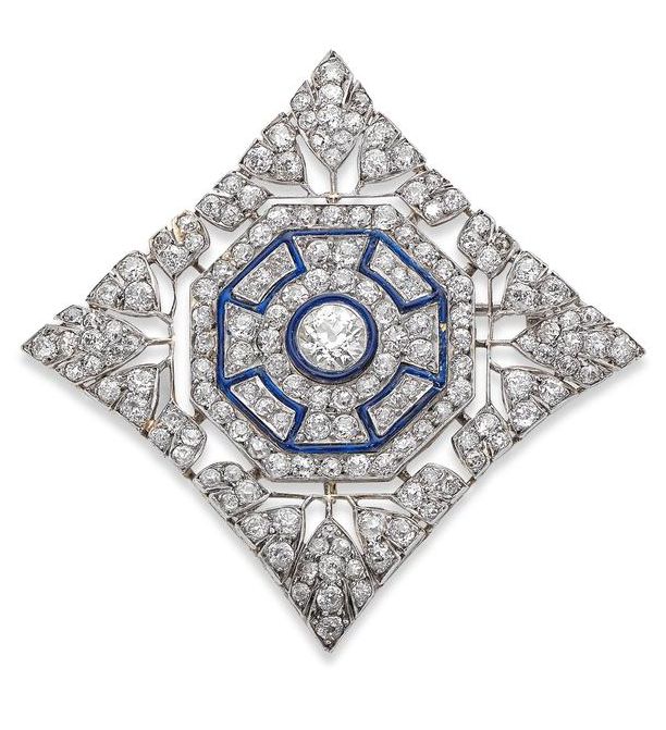 An Art Deco enamel and diamond plaque brooch.