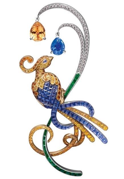 Brooch from the collection Oiseaux de Paradis. White gold, emeralds, diamonds, s...